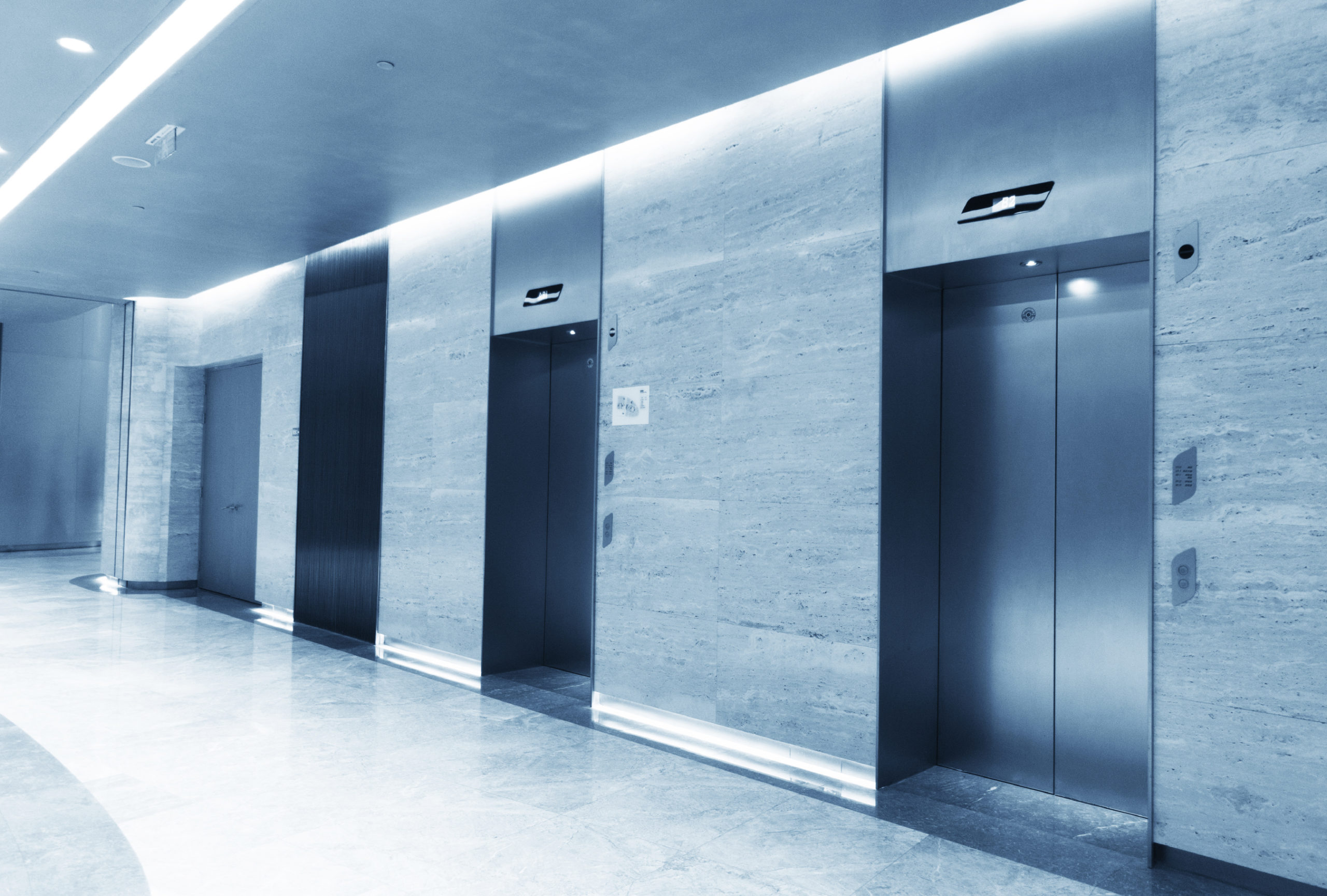Elevator corridor with blue grey materials